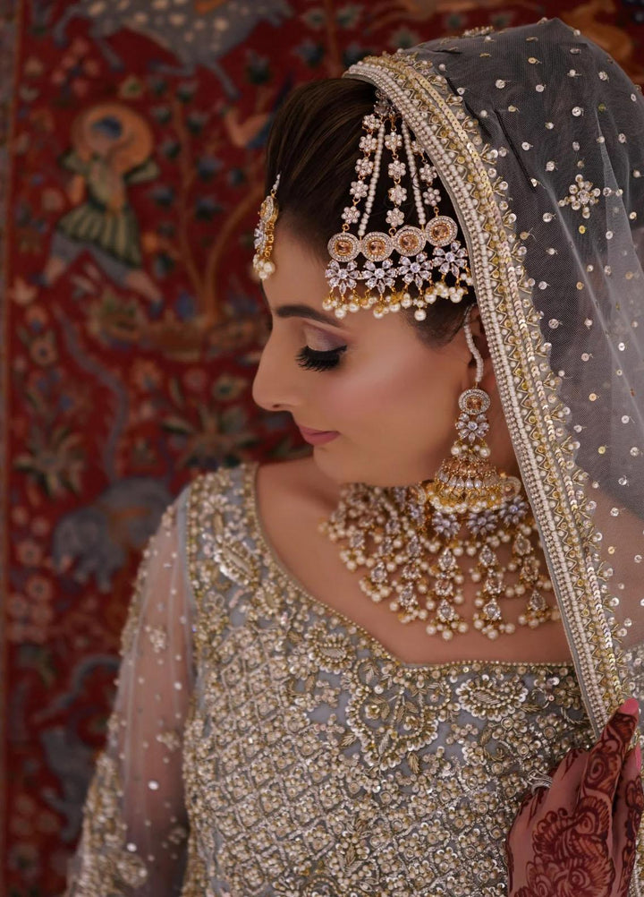 Maroon by Iqra Chaudhry Pret Embroidered Raw Silk 3 Piece Suit Umrao