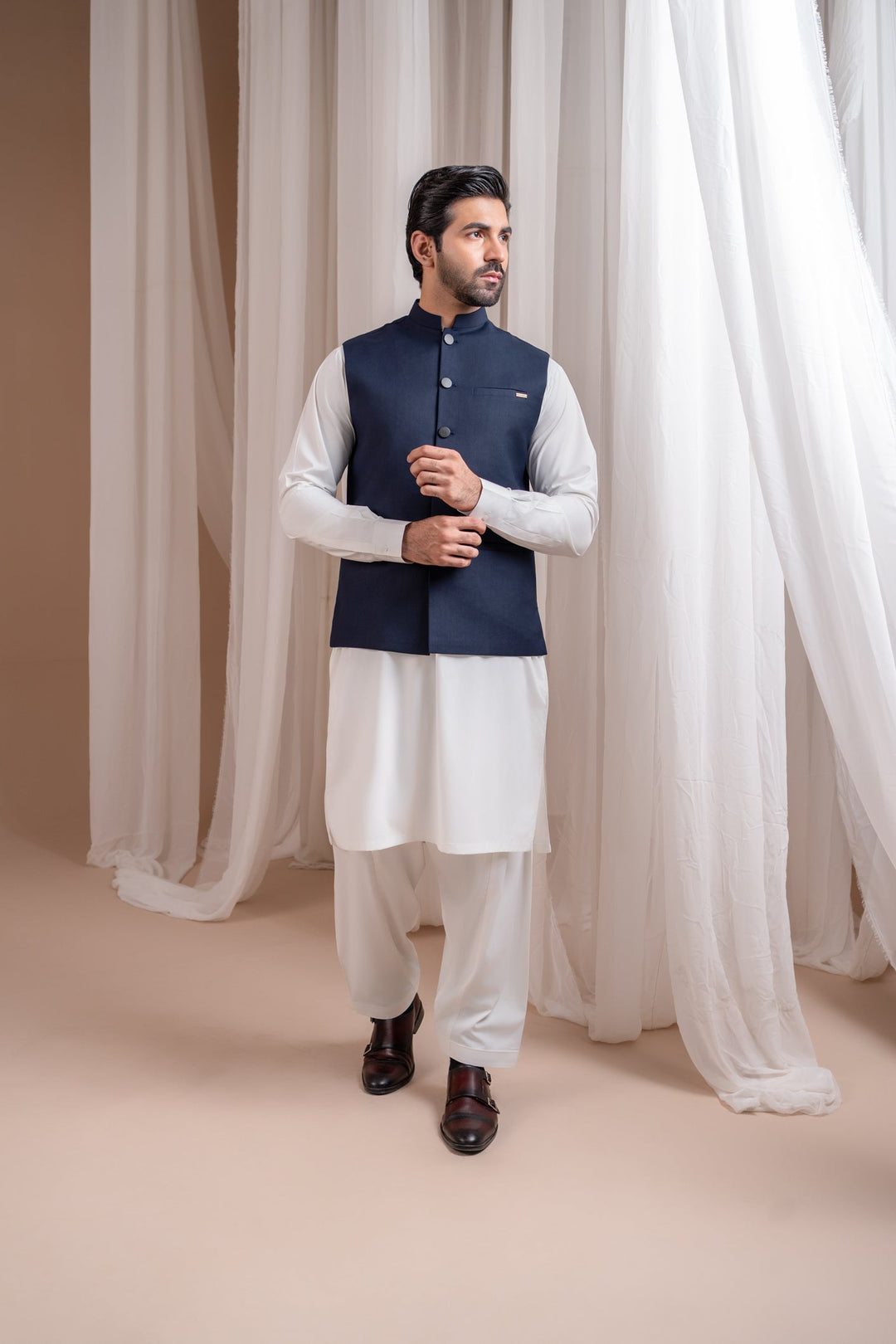 Muraqsh Ready To Wear Solids Cotton Men Off White Kurta Shalwar with Navy Blue Suiting Waistcoat Straight Cut MUR-OWKSW-KT - Summer Collection