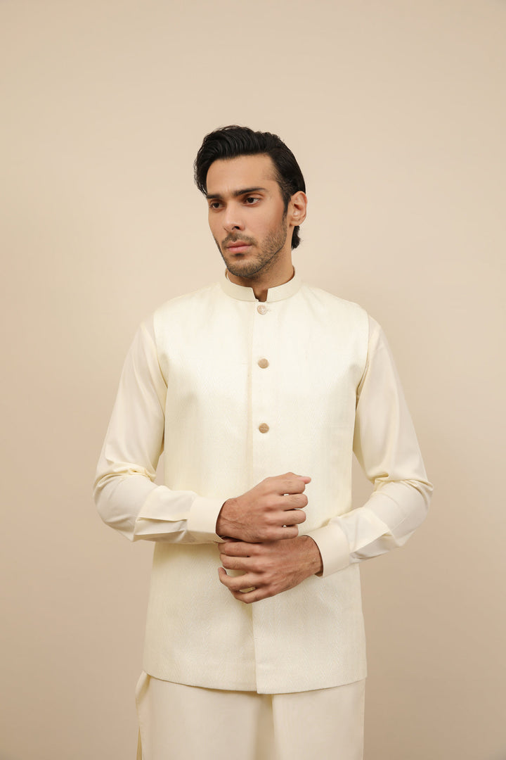 Muraqsh Ready To Wear Solids Bosky Men Bosky White Kurta Trouser with Off White Jamawar Waistcoat MUR-BWKTW - Summer Collection