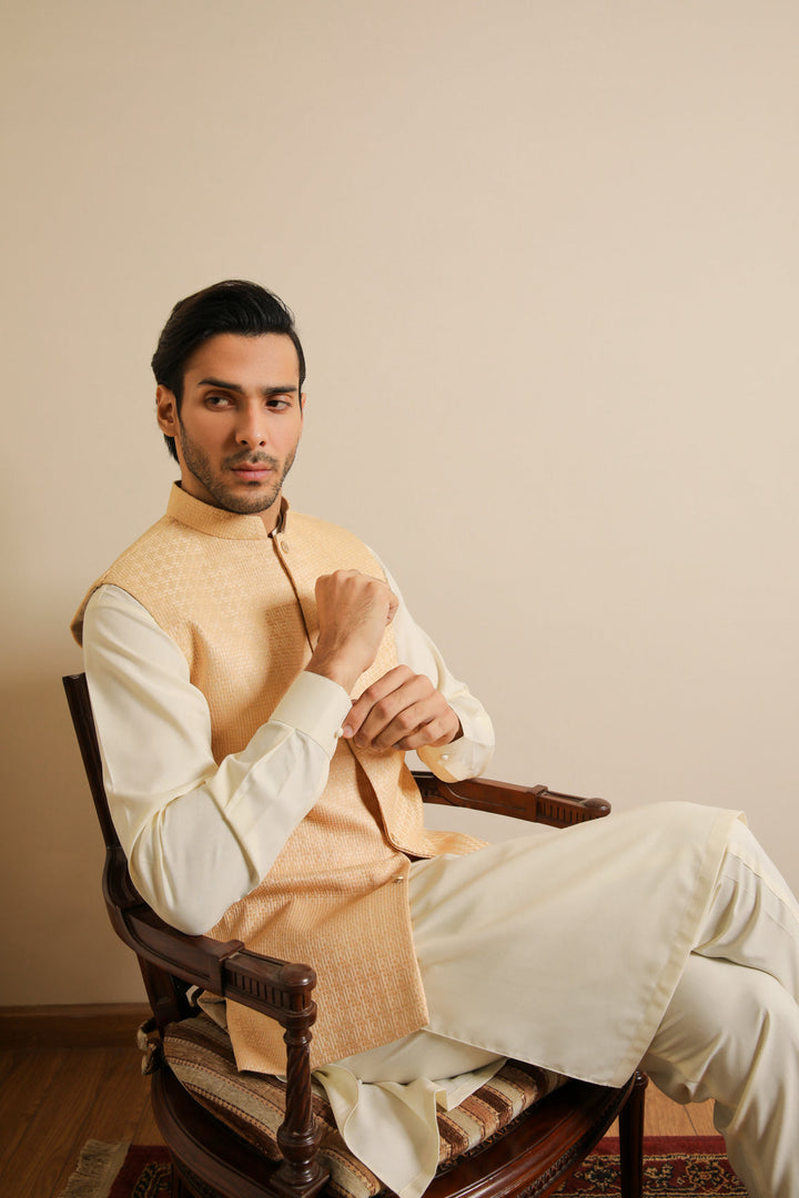 Muraqsh Ready To Wear Solids Bosky Men Bosky White Kurta Trouser with Skin Jamawar Waistcoat MUR-BWKTW - Summer Collection