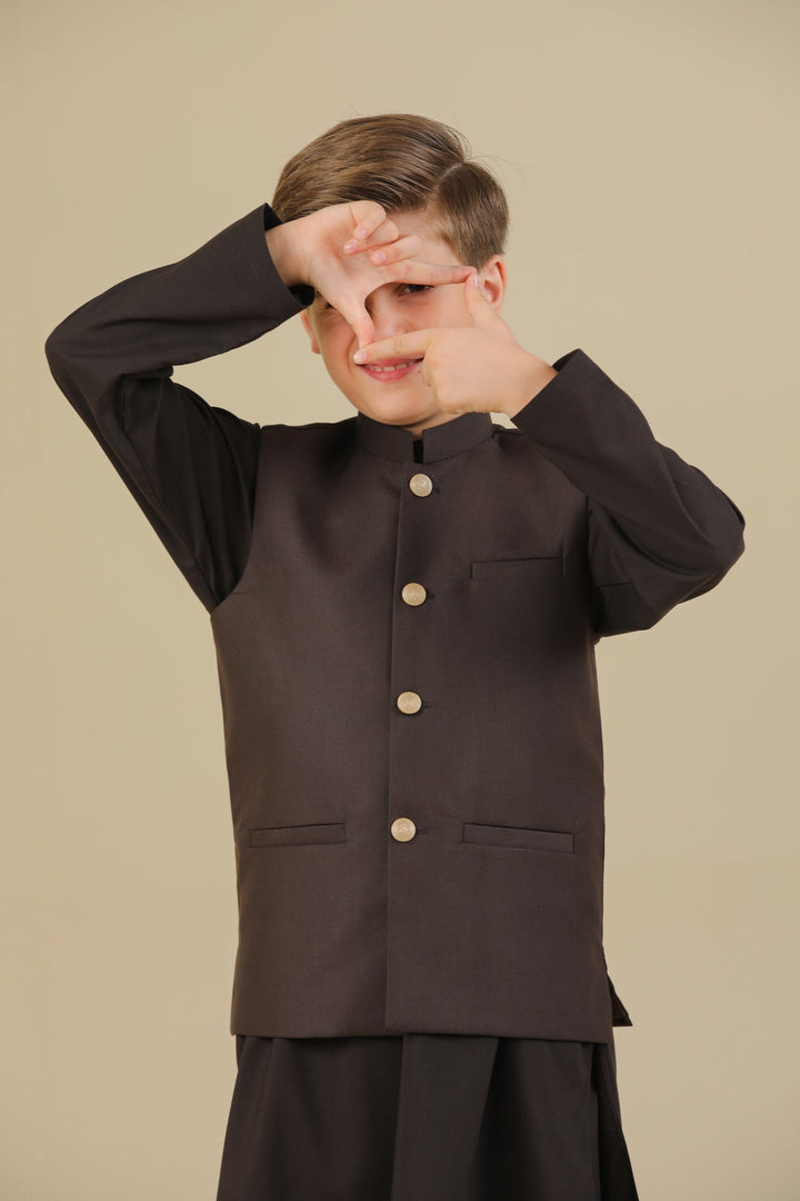 Muraqsh Ready To Wear Solids Cotton Boys Dark Brown Kurta Trouser with Suiting Waistcoat Straight Cut MUR-DBKTW - Summer Collection