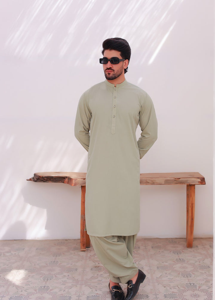 Khuzaim by Nomi Nisar Men RTW Wash N Wear Pista Kameez Shalwar - Summer Collection